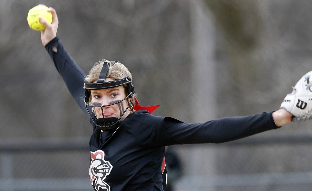 Lincoln-Way Central pitcher Bella Dimitrijevic pulls the ball back and fires a pitch against Providence during a nonconference game in New Lenox on Tuesday, March 21, 2023.