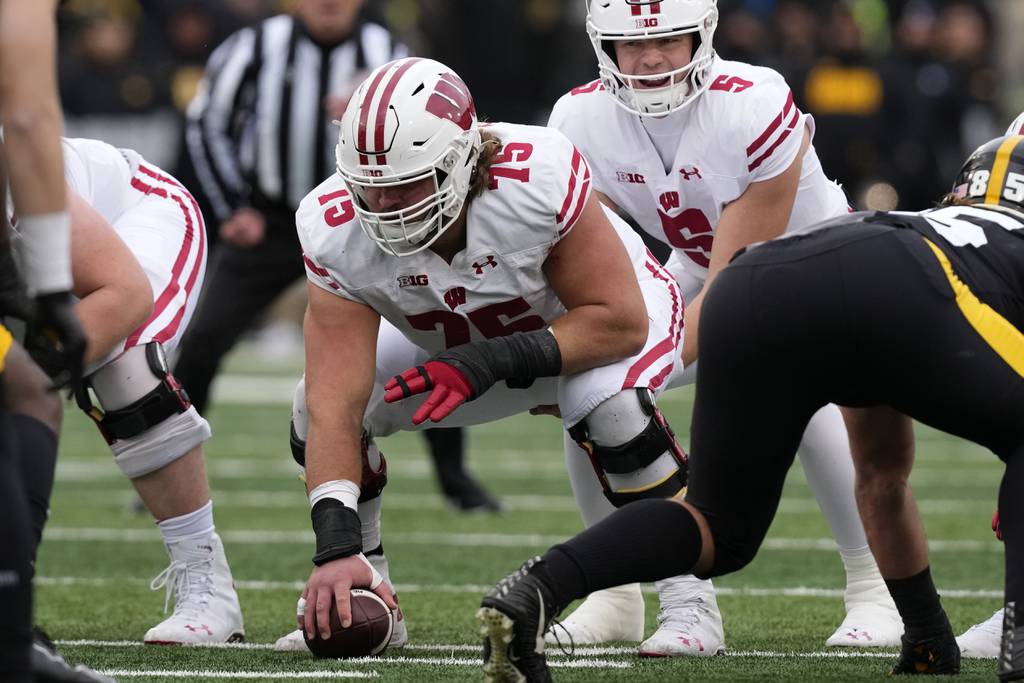 Wisconsin offensive lineman Joe Tippmann gets set to snap the ball during the first half against Iowa on Nov. 12, 2022.
