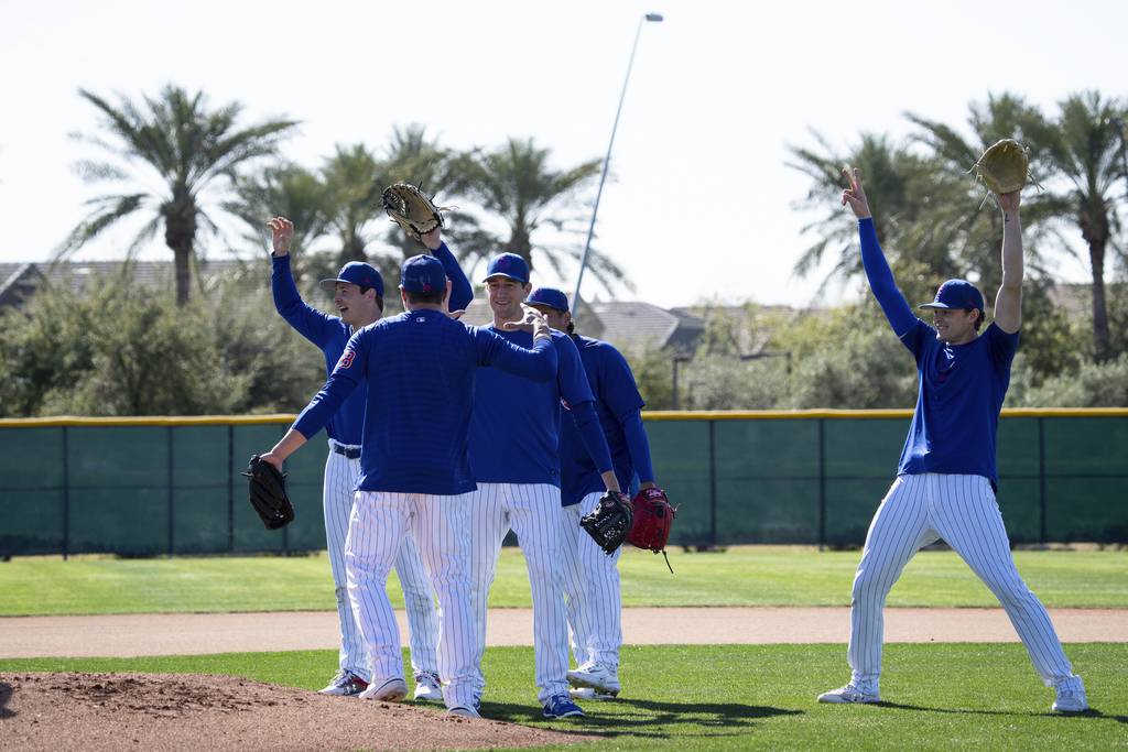 Cubs pitchers joke around during workouts at Sloan Park in Mesa, Ariz., on Feb. 23, 2023.