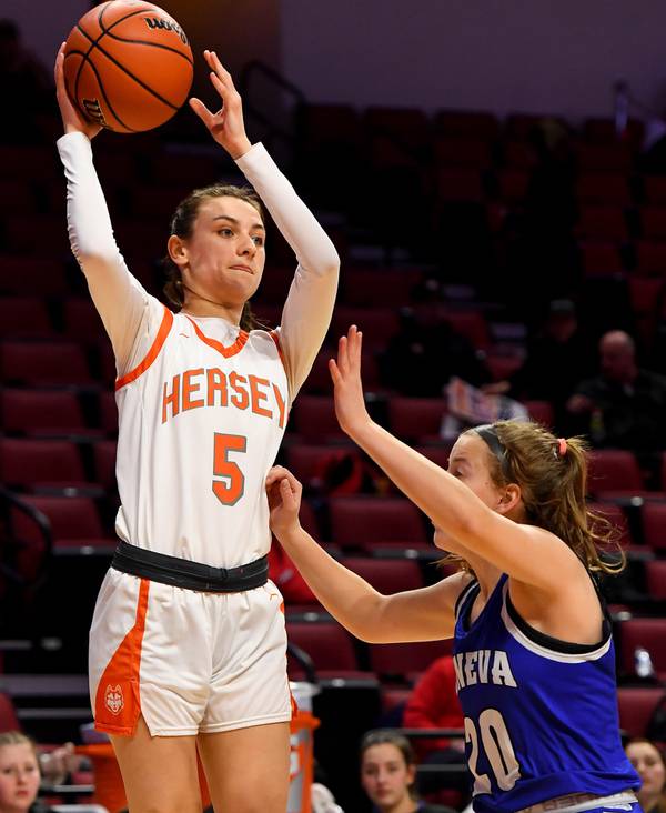 Hersey’s Katy Eidle (5) throws a pass over Geneva’s Caroline Madden (20) during the Class 4A third-place game at Illinois State’s CEFCU Arena in Normal on Friday, March 3, 2023. 