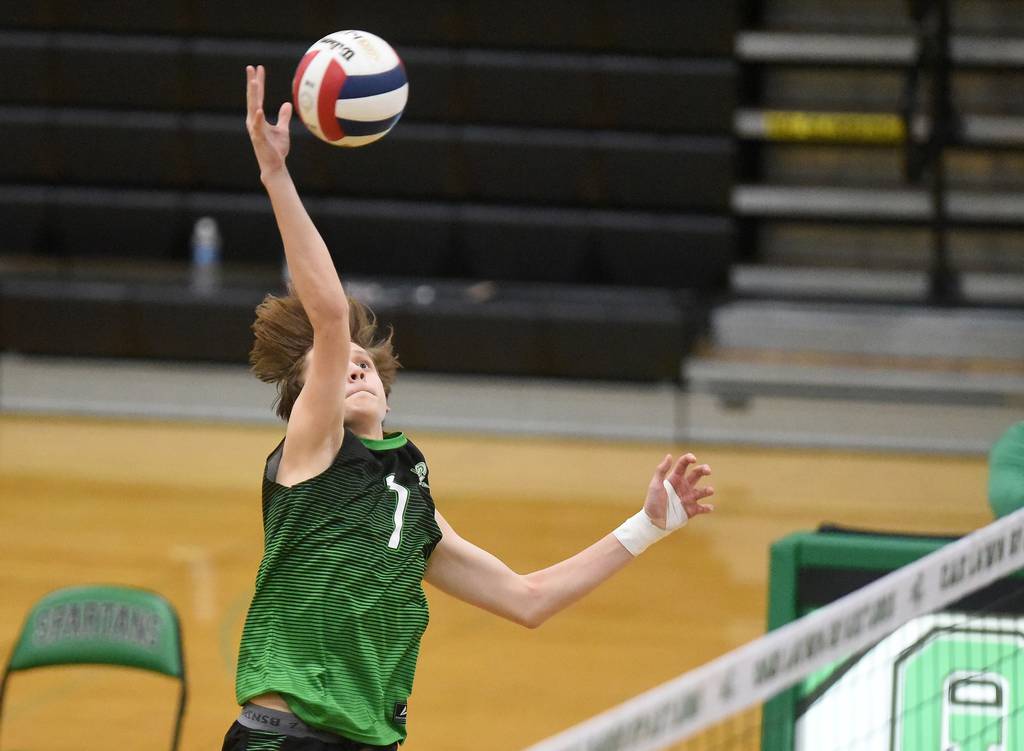 Oak Lawn's Simon Komperda (7) goes up for a kill against St. Laurence during a nonconference match in Oak Lawn on Thursday, March 23, 2023.