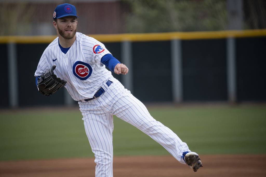 Cubs reliever Brandon Hughes throws pregame batting practice on March 1 at Sloan Park in Mesa, Ariz. 
