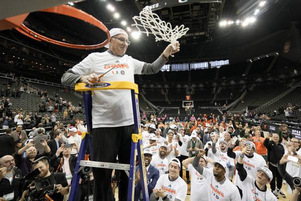 Miami head coach Jim Larranaga celebrates during the net cutting after their win against Texas in an Elite 8 game on March 26, 2023.