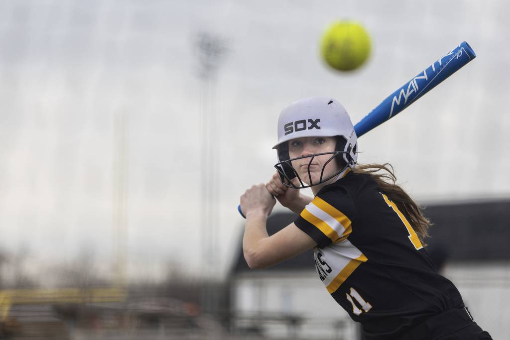 Marian Catholic's Gracie Jensen gets some swings during practice in Chicago Heights on Monday, March 20, 2023.