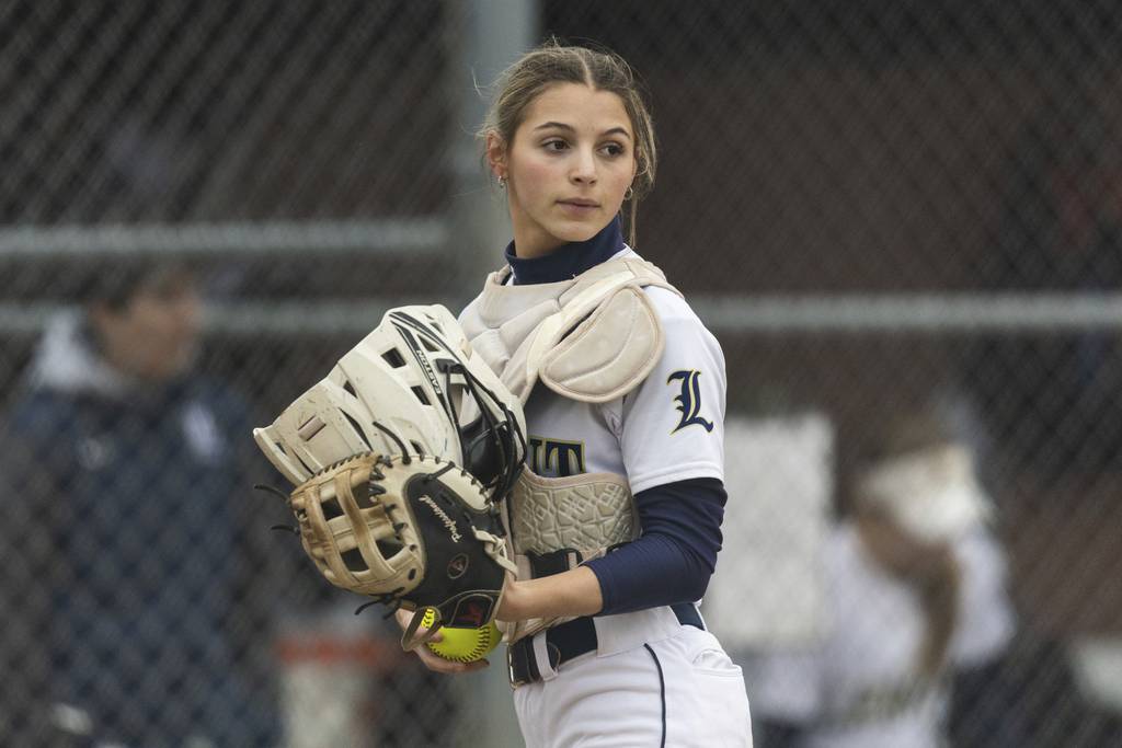 Lemont’s Frankie Rita (24) looks back after chasing down a ball against Marist during a nonconference game in Chicago on Wednesday, March 22, 2023.