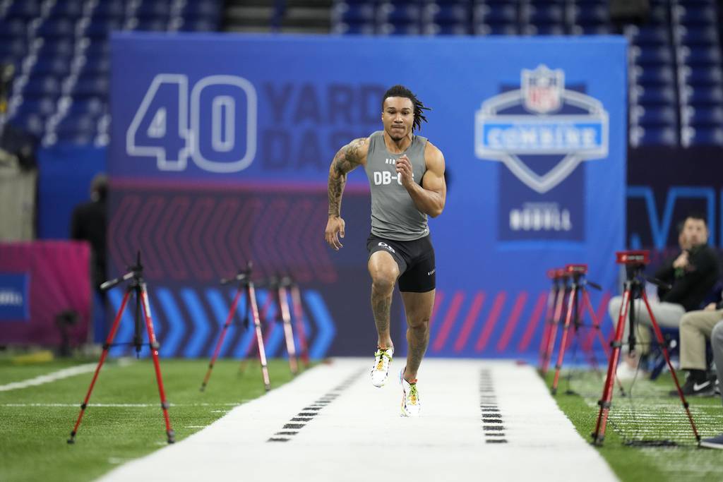 Alabama defensive back Brian Branch runs the 40-yard dash at the NFL combine on March 3, 2023.