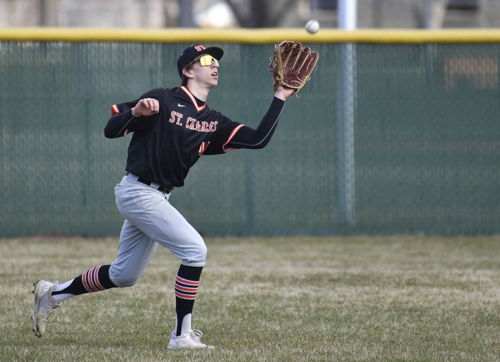 St. Charles East center fielder Clay Jensen makes a catch against Waubonsie Valley during a nonconference game in Aurora on Monday, March 27, 2023.