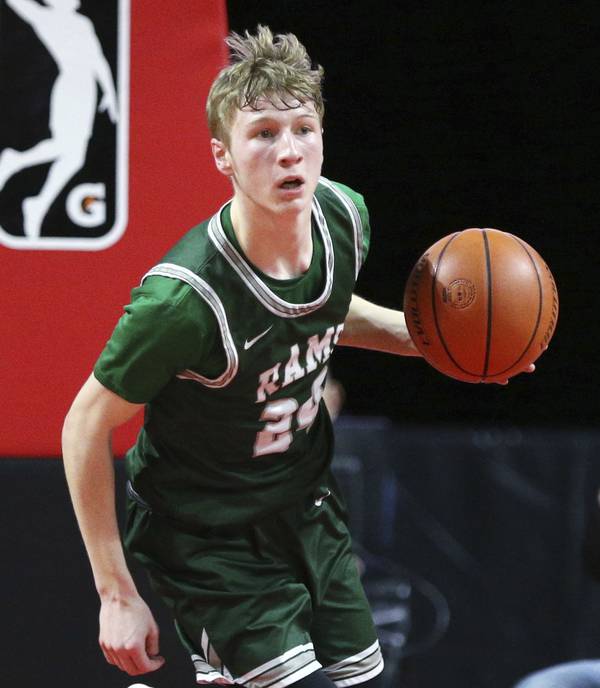 Grayslake Central’s Dennis Estepp (24) looks to push the ball up the court during the Class 3A Hoffman Estates Supersectional against St. Ignatius at NOW Arena on Monday, March 6, 2023.