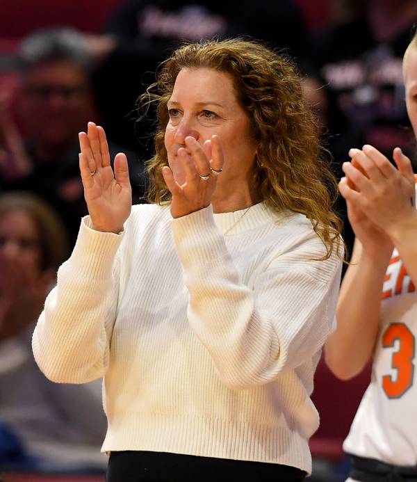 Hersey coach Mary Fendley applauds during the Class 4A third-place game against Geneva at Illinois State’s CEFCU Arena in Normal on Friday, March 3, 2023. 