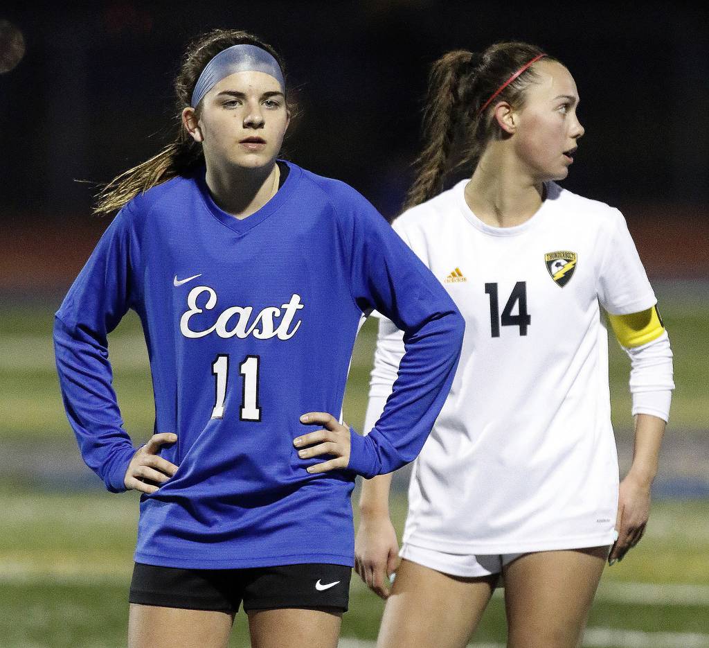Lincoln-Way East's Cami Butler (11) waits with Andrew's Abbie Bosco (14) for a throw-in during a SouthWest Suburban Conference crossover in Frankfort on Tuesday, March 28, 2023.