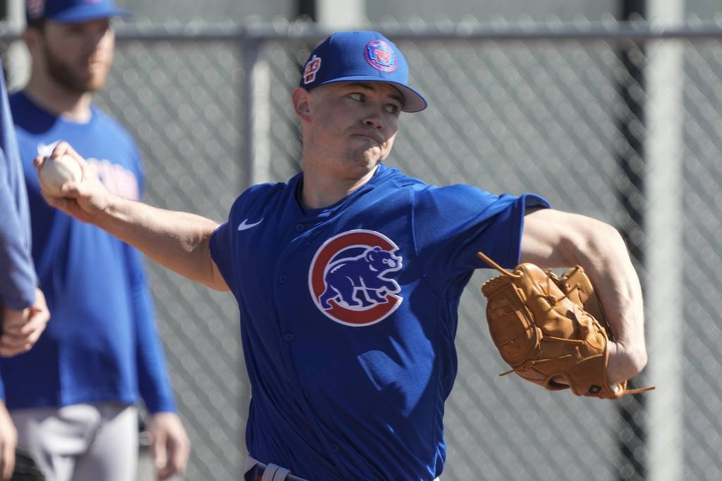 Cubs right-hander Keegan Thompson throws during a spring training workout on Feb. 15 in Mesa. 