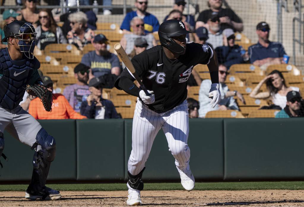 White Sox outfielder Oscar Colás singles against the Mariners in a Cactus League game Feb. 27 at Camelback Ranch in Glendale, Ariz. 