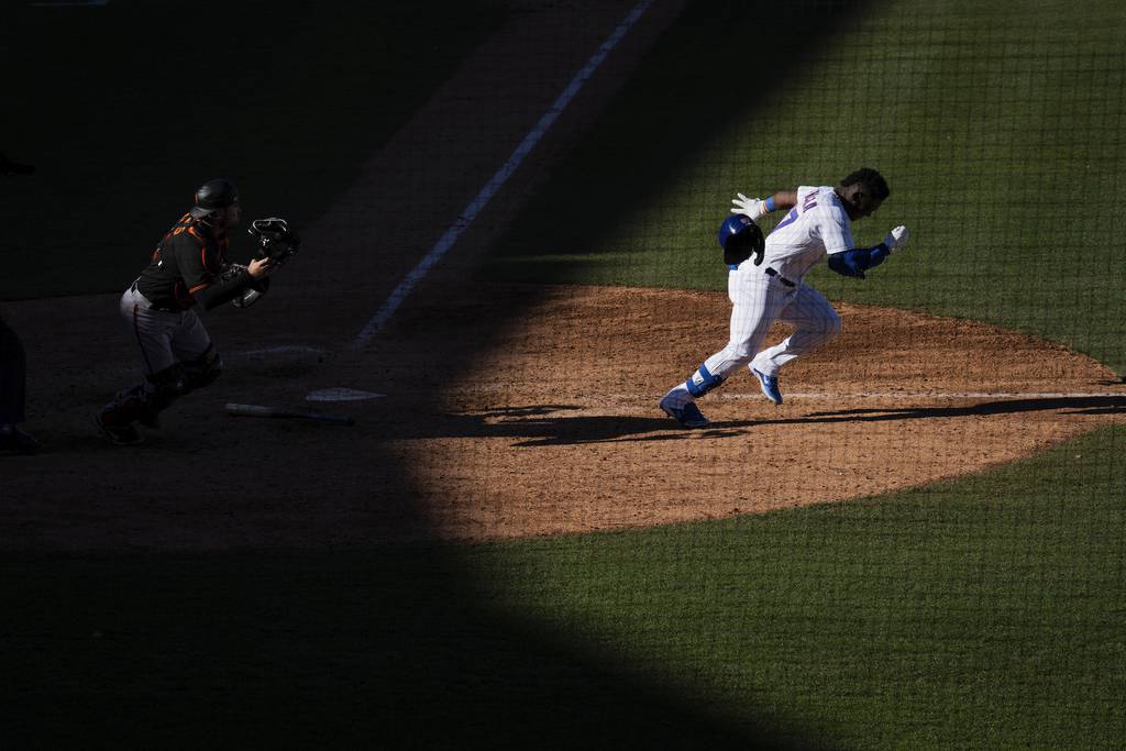 Yonathan Perlaza grounds into a force out in the 8th inning of the Cubs’ 10-8 victory over the San Francisco Giants at Sloan Field in Mesa, Arizona, on Feb. 25, 2023.   