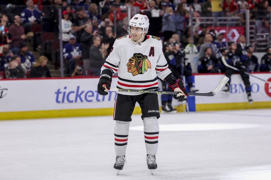 Blackhawks right wing Patrick Kane smiles after completing a hat trick against the Toronto Maple Leafs at the United Center on Feb. 19, 2023.