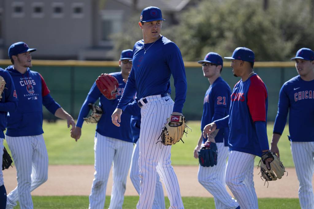 Hayden Wesneski  and Cubs pitchers work on pickoff drills at Sloan Park on Feb. 23, 2023, in Mesa, Ariz. 