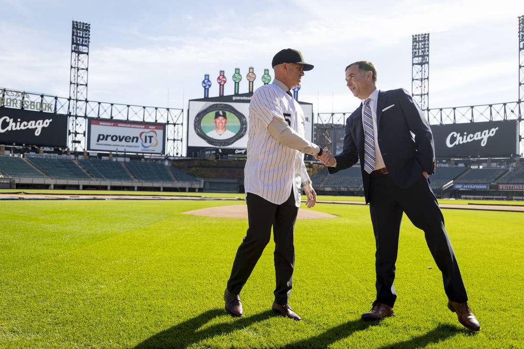 New White Sox manager Pedro Grifol shakes hands with general manager Rick Hahn on Nov. 3, 2022, at Guaranteed Rate Field.