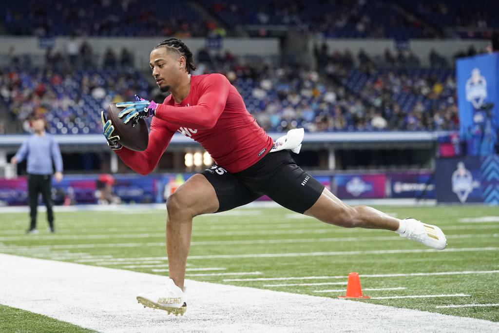 Ohio State wide receiver Jaxon Smith-Njigba runs a drill at the NFL scouting combine on March 4, 2023, in Indianapolis.