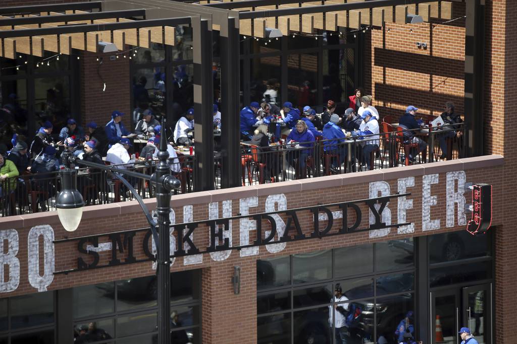 Chicago Cubs fans pack the upper level of Smoke Daddy in the Hotel Zachary on opening day at Wrigley Field April 10, 2018.