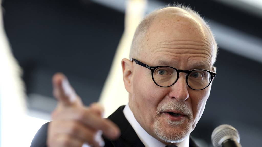 Chicago mayoral candidate Paul Vallas answers questions from reporters after receiving the endorsement of plumbers union members in Chicago on March 27, 2023. 
