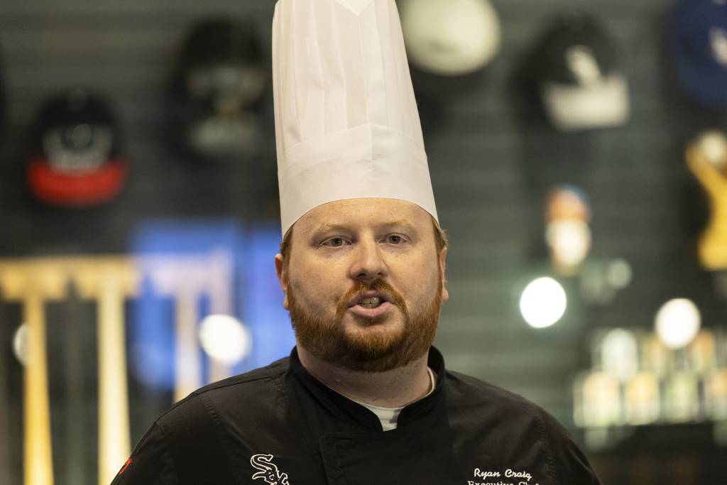 Executive chef Ryan Craig introduces the new premium menu items on March 22, 2023, at Guaranteed Rate Field. 