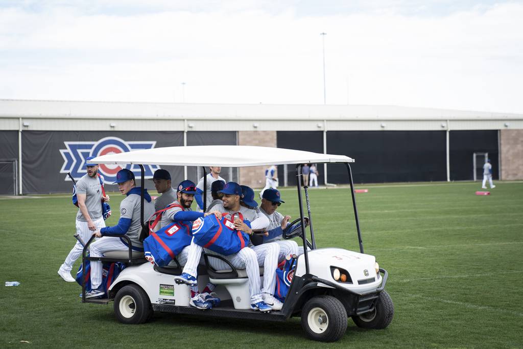 Cubs players head to warm ups before the Cubs’ preseason opener at Sloan Field in Mesa, Arizona on Feb. 25, 2023.    