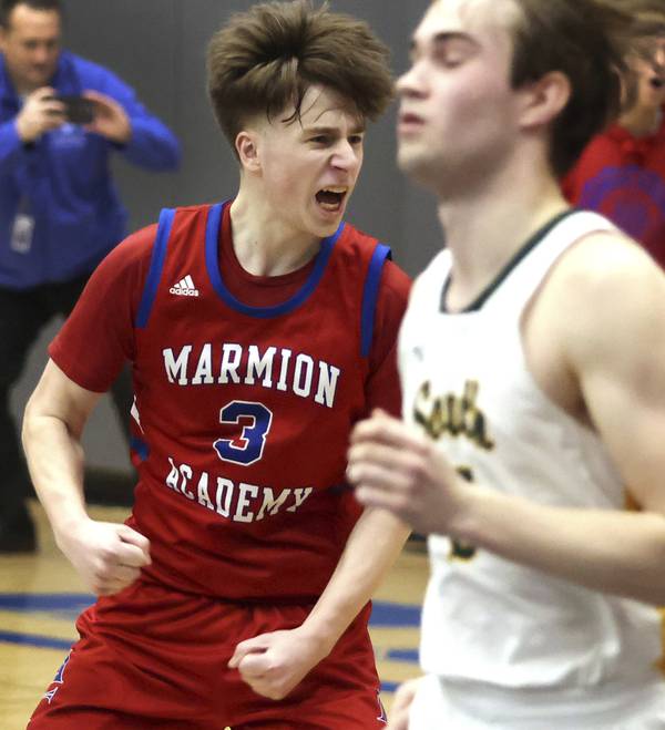 Marmion's Collin Wainscott (3) reacts after sinking a 3-point basket against Crystal Lake South with 9.8 seconds left in the fourth quarter of a Class 3A Burlington Central Sectional semifinal game on Tuesday, Feb. 28, 2023.