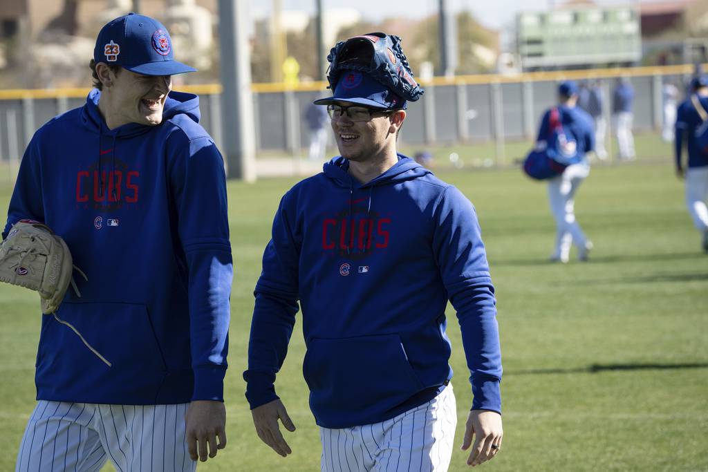 Codi Heuer, left, and Ethan Roberts chat during Cubs workouts at Sloan Park on Feb. 23, 2023, in Mesa, Ariz. 