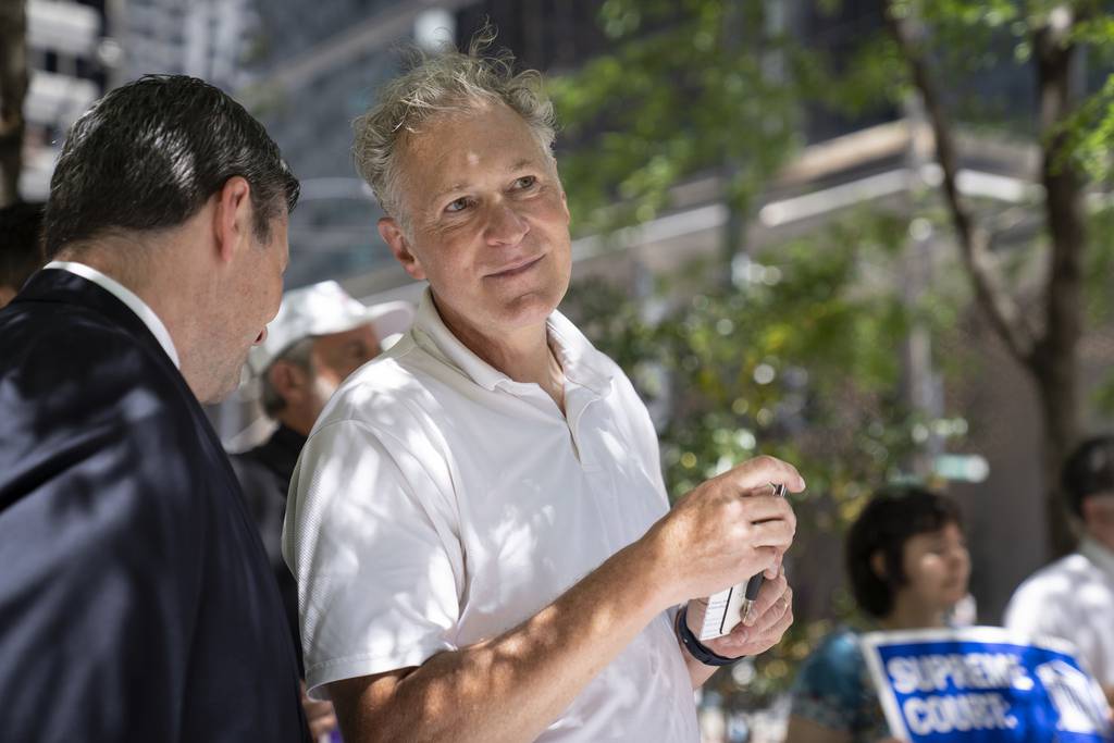 Eric Scheidler, executive director of the Chicago-based Pro-Life Action League, gathers with supporters at Federal Plaza in Chicago on June 24, 2022. 