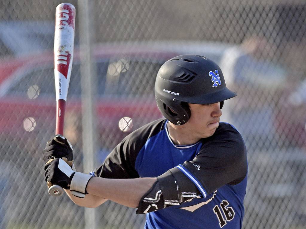 Newark's Joe Martin concentrates during an at-bat against Aurora Christian during a nonconference game in Newark on Tuesday, April 11, 2023.