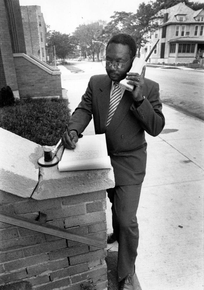 Chicago businessman Ed Lang conducts business out and about in August 1989.
