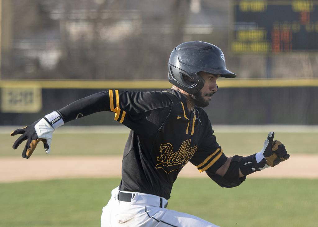 Richards' Fabian Mejia runs to first base against Shepard during a South Suburban Red game in Oak Lawn on Tuesday, April 11, 2023.