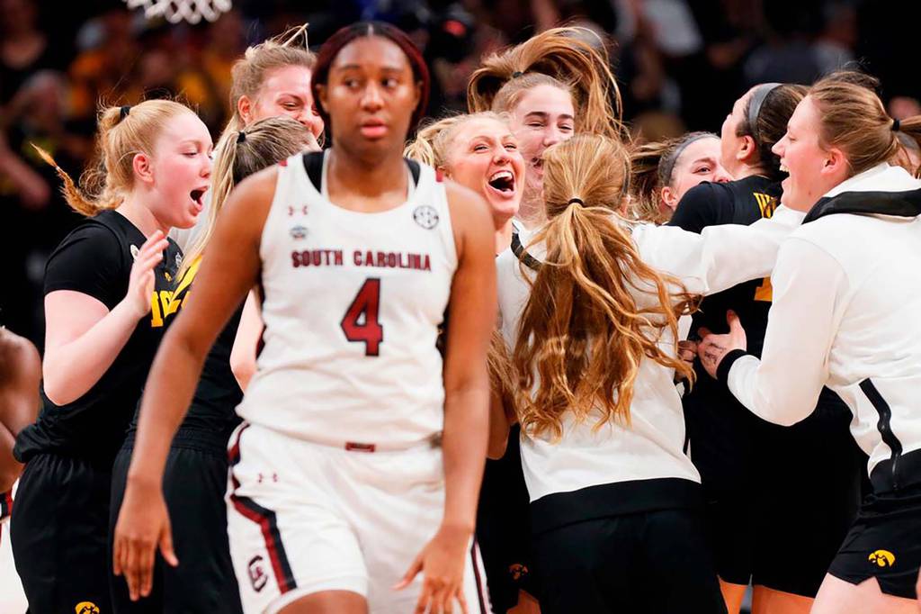 South Carolina's Aliyah Boston walks back to her bench after a 77-73 loss to Iowa in the Final Four on March 31, 2023.