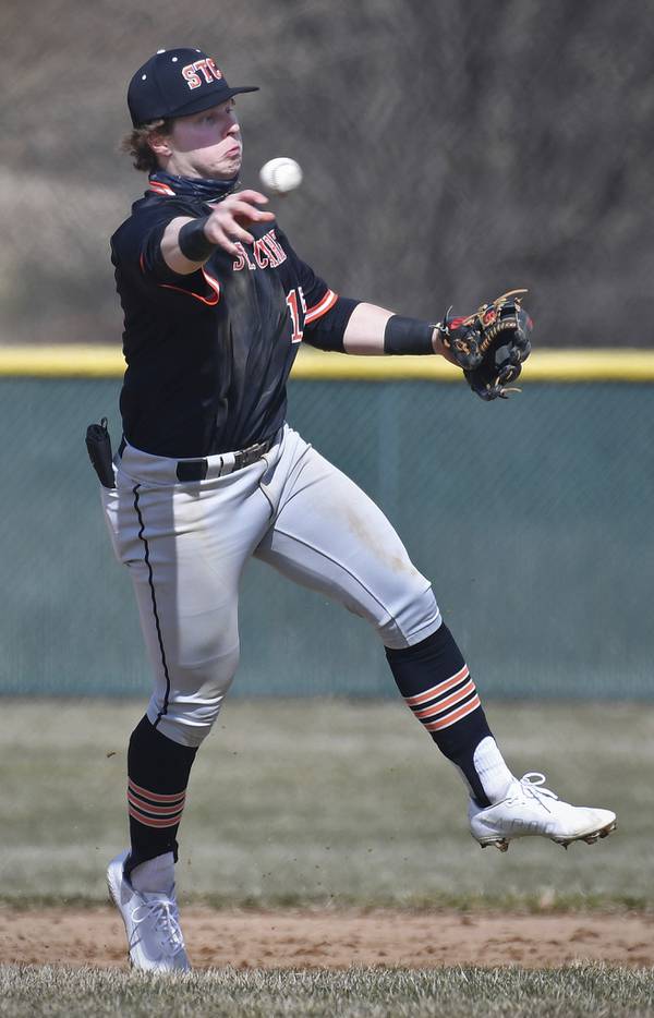 St. Charles East shortstop Seth Winkler throws out a Waubonsie Valley runner during a nonconference game in Aurora on Monday, March 27, 2023.