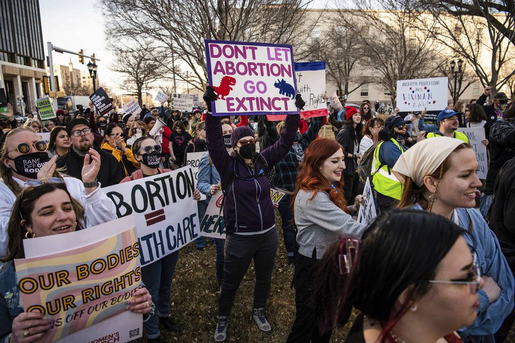 Protesters gather in support of women's right to access the abortion medication mifepristone, in Amarillo, Texas, Feb. 11, 2023. 
