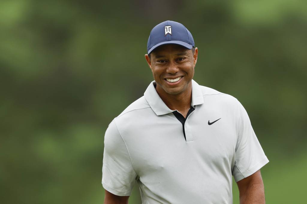 Tiger Woods reacts as he putts on the seventh hole during the practice round for the Masters at Augusta National Golf Club on April 4, 2023.