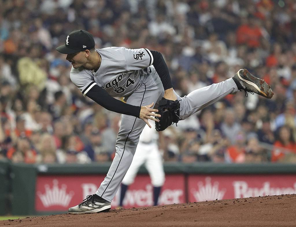 White Sox starter Dylan Cease pitches in the first inning against the Astros on March 30, 2023, in Houston.