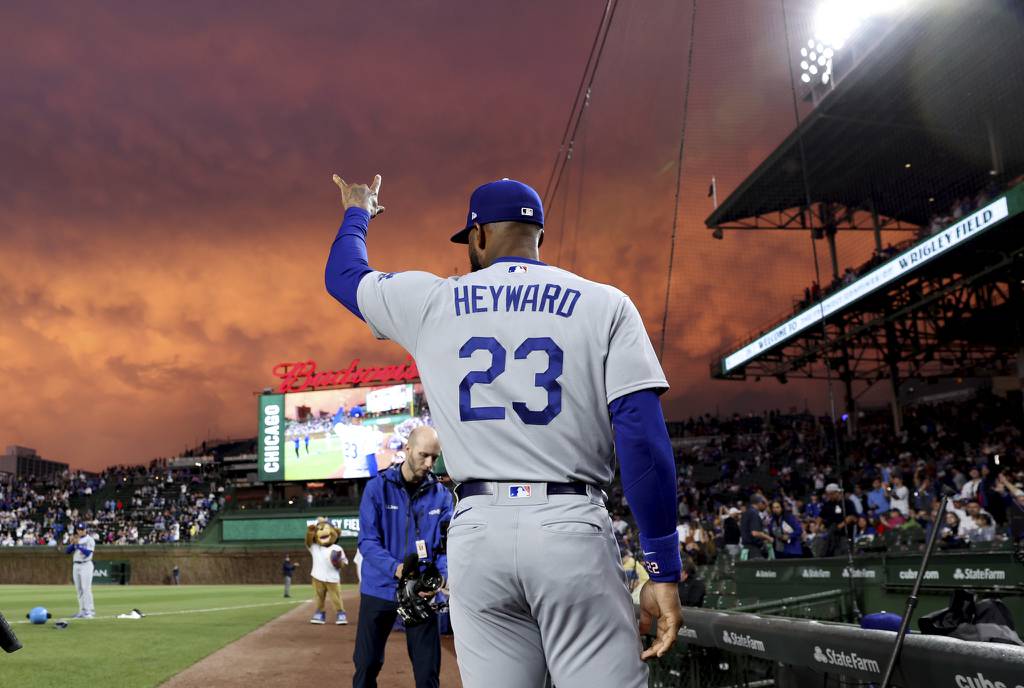 Dodgers center fielder Jason Heyward waves to the crowd as his is announced before a game against the Cubs on Thursday at Wrigley Field. Heyward played for the Cubs from 2016-22. 