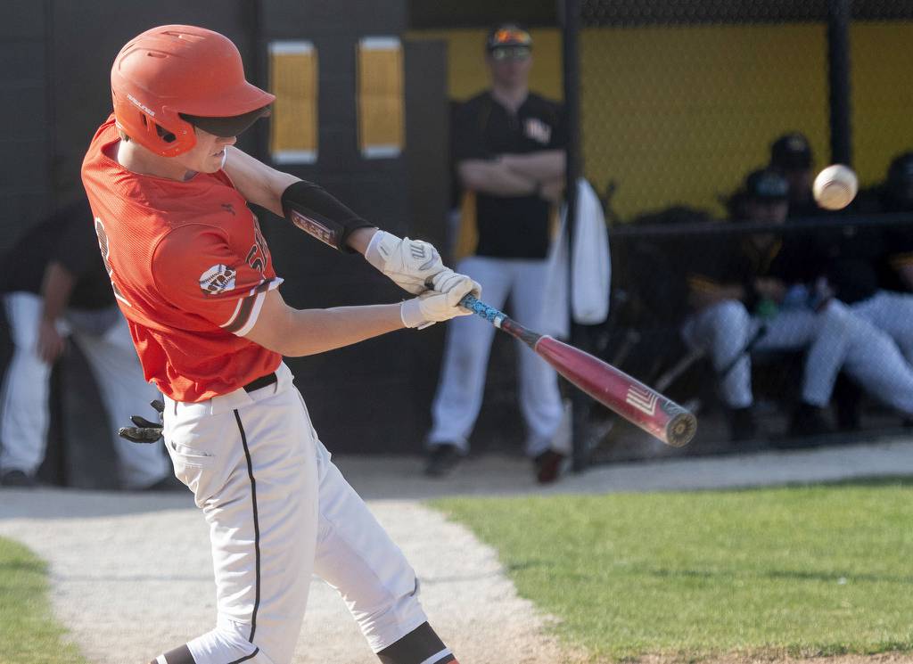 Shepard's Owen McGovern connects against Richards during a South Suburban Red game in Oak Lawn on Tuesday, April 11, 2023.