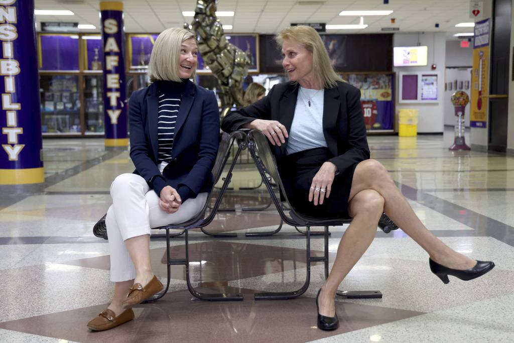 Rolling Meadows High School Principal Eileen Hart, right, and Megan Kelly, left, in the lobby of the school on April 24, 2023. Kelly is the director of academic programs and pathways in District 214 and will replace Hart when she retires after this school year.   