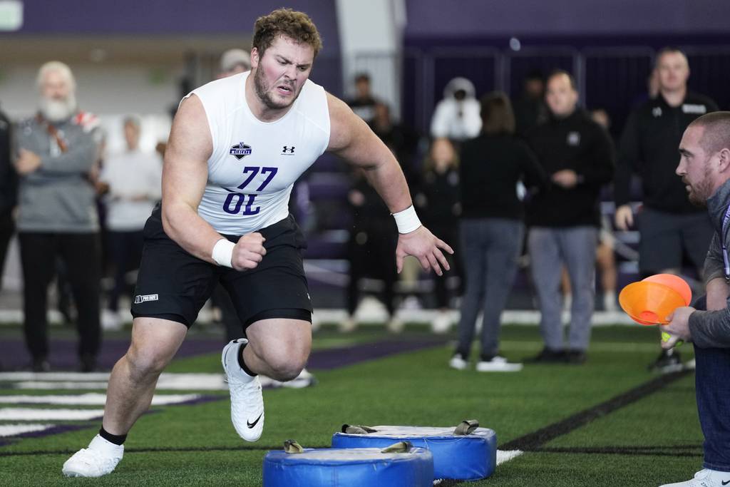 Offensive lineman Peter Skoronski participates in a position drill during Northwestern's pro day on March 14, 2023.