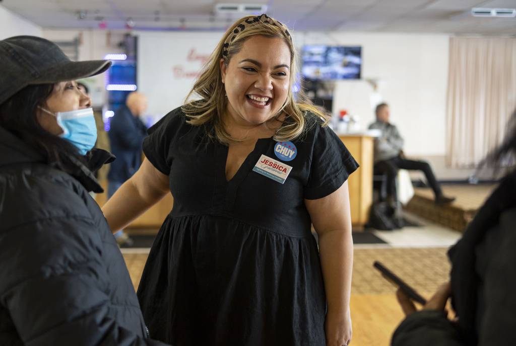 Jessica Gutiérrez, an aldermanic candidate for the 30th Ward, greets people during a campaign event, Feb. 19, 2023, at Lago Banquet Hall in Belmont Cragin. 