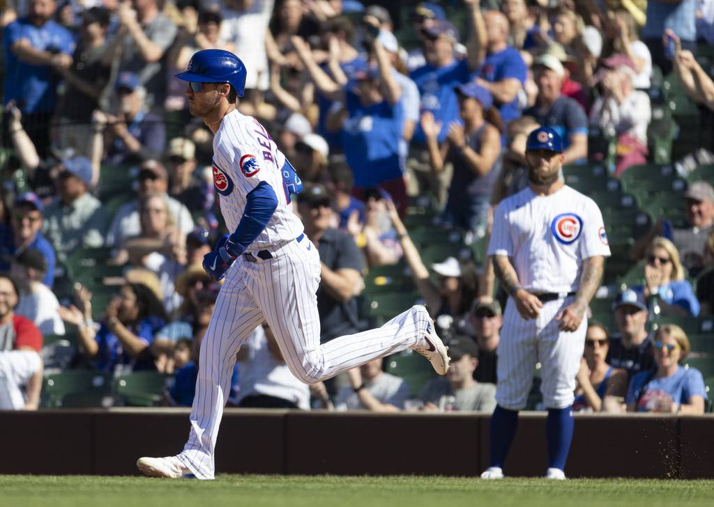 Cubs center fielder Cody Bellinger rounds the bases with a home run in the ninth inning on April 12, 2023, at Wrigley Field. 