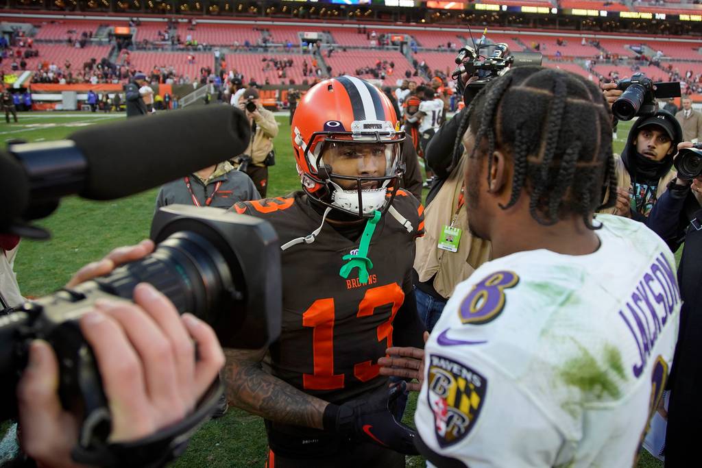 Ravens quarterback Lamar Jackson, right, shakes hands with Browns wide receiver Odell Beckham Jr. after a game on Dec. 22, 2019, in Cleveland.