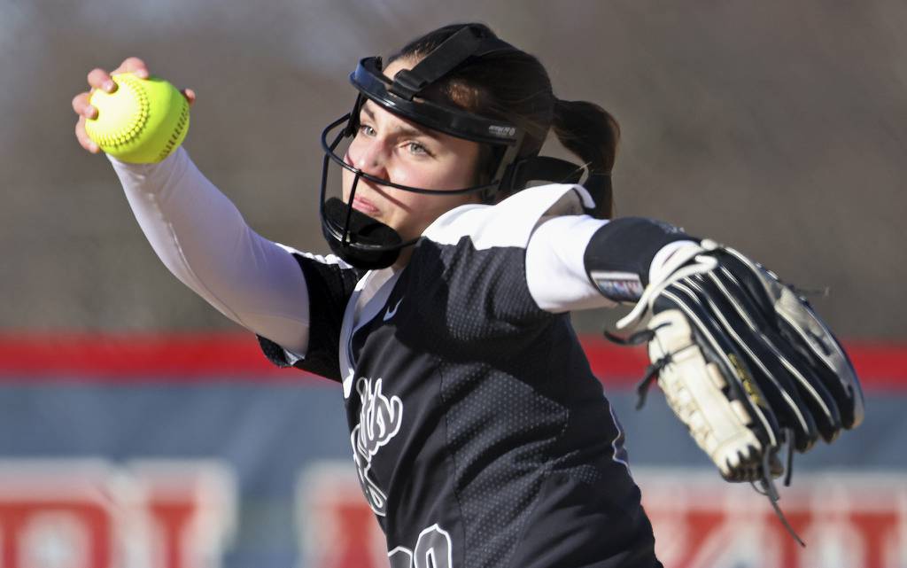 Kaneland pitcher Brynn Woods (29) prepares to deliver a pitch against West Aurora during a nonconference game in Aurora on Thursday, April 6, 2023.