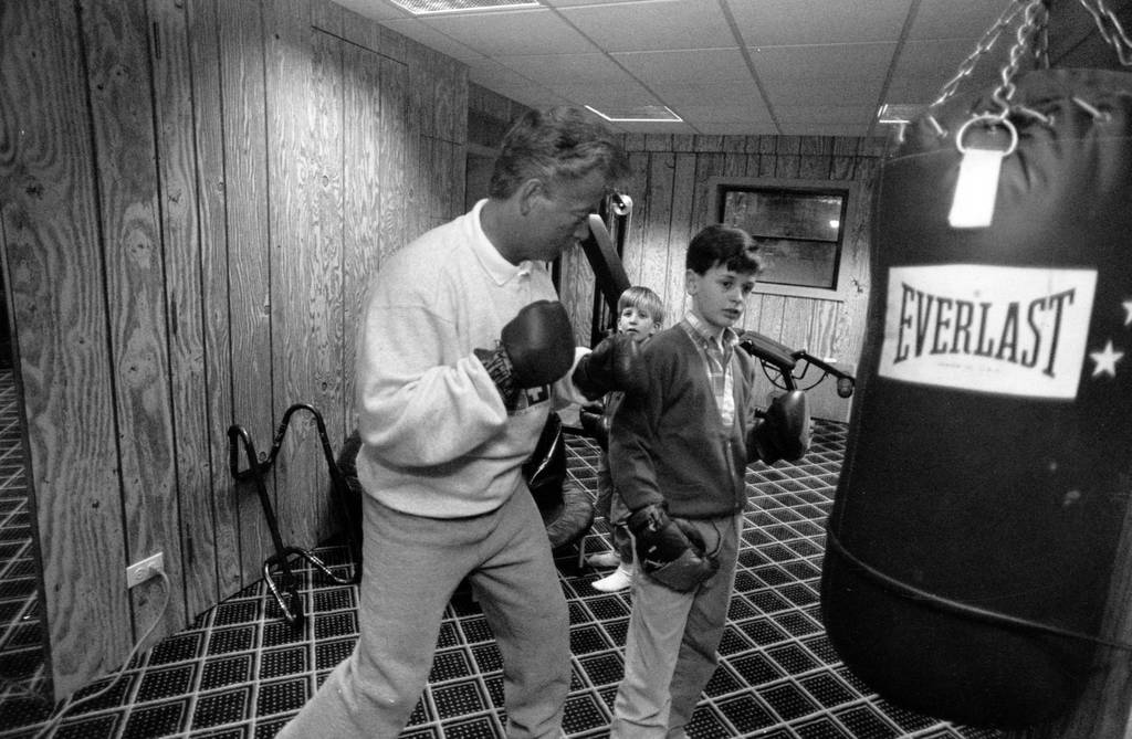 Former Golden Gloves boxer John “Jack” Sandner passes along pointers to his sons Michael and Nicky while at their home in Lake Bluff in March of 1992.