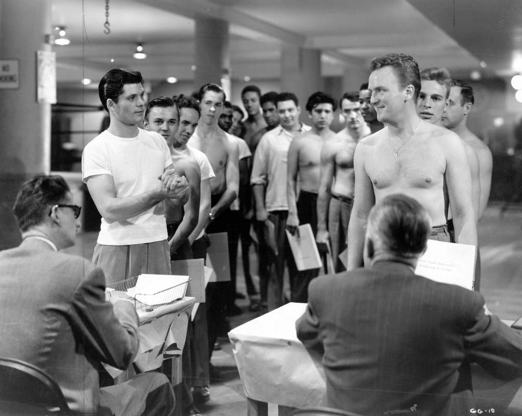 A scene from “The Golden Gloves Story” shows promising Chicago Golden Gloves fighter Nick Martel, left, played by Dewey Martin. 