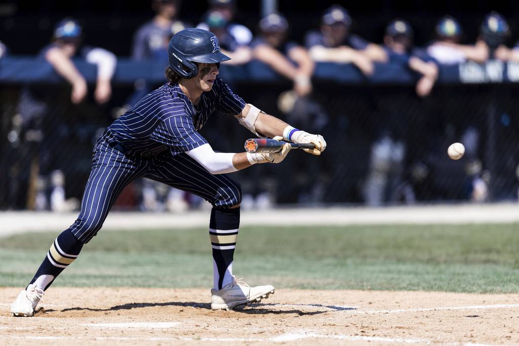 Lemont’s Gavin Kelby (2) attempts a bunt against Stagg during a nonconference game in Lemont on Saturday, April 8, 2023.