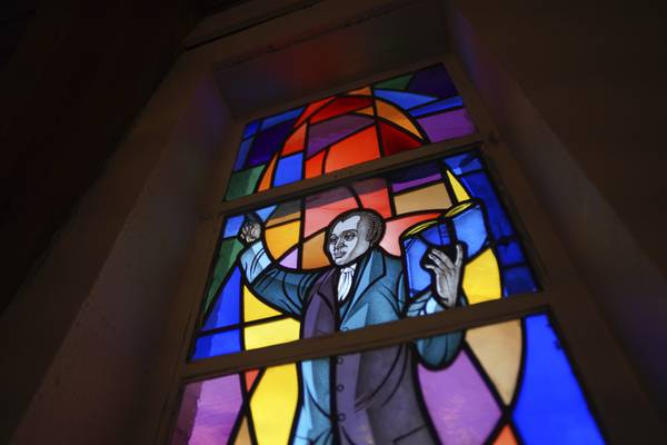 A stained-glass window honors the founder of the African Methodist Episcopal Church denomination, Richard Allen, at Bethel AME Church on April 11, 2023.