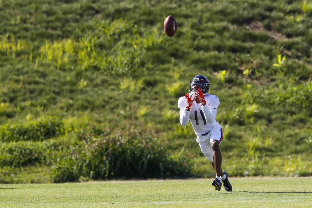 Bears wide receiver Darnell Mooney fields balls with the special teams group during training camp at Halas Hall on Aug. 20, 2020.