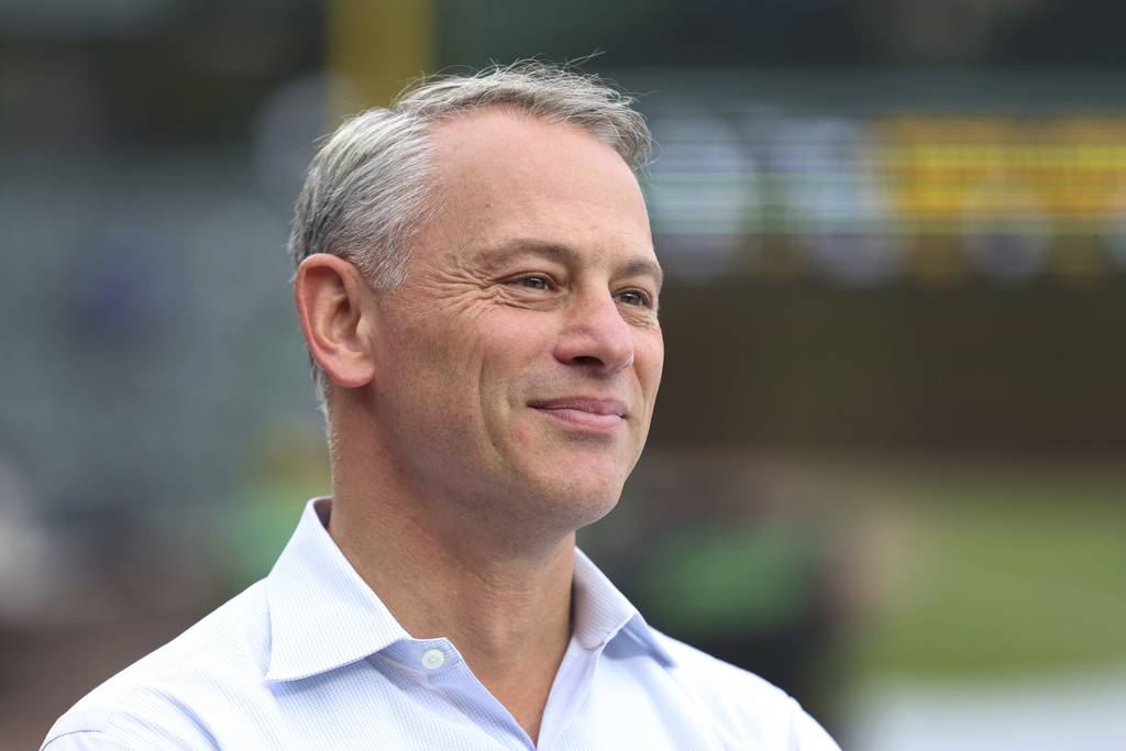 Cubs President Jed Hoyer hangs out on the field before the start of a game against the Dodgers on Thursday at Wrigley Field.